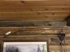 Connecticut Valley Arms Inc. Black powder rifle - has been used as a decorative wall hanger