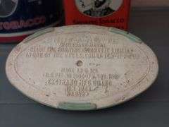 Tobacco tins, Scottie dog ashtray, two Snuf-a-rettes