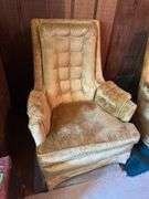 Pair of gold stationary chairs