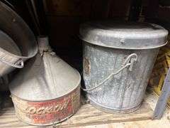 Gas cans, small galvanized trash cans, files and other tools PLUS THE SHELF Shelves 3 & 4