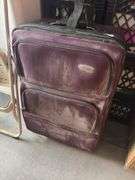 Set of two purple, soft side, Samsonite suitcases