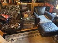 Pair of arm chairs with ottomans - both have large wear spots