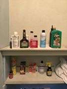 Contents of metal shelf and above stairs includes motor oil, deicers, washer fluid, extension cords, glues, etc