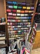 Huge quantity of ribbons and dispenser rack plus lots of gift wrapping items