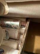 New curtain rods and box of wallpaper, some new