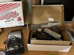 Portable radio, cassette tapes, playing cards, telephones etc...