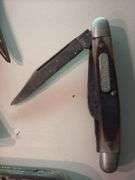 Old Timer pocket knife, tire repair kit tin and brass angel candle holders