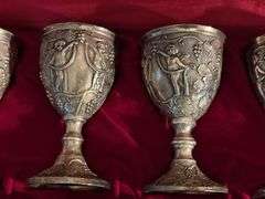 Set of 4 Corbell & Co silverplate mini goblets with cherubs and grapevines
