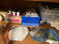 Lots of kitchen linens, plus candles, cups etc...