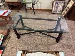 23 x 46 glass top metal legged coffee table