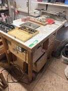 Large router table includes router and lots of router bits - try to come at the end - may need disassembled to remove