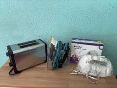 Hamilton Beach two slice toaster (like new), Rival hand mixer appears to be NIB and an old GE iron