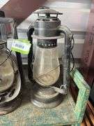 Two Dietz lanterns and two small skaters lanterns