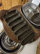 Heavy pewter trays, pampered chef baking pans, antique cast iron corn bread mold and antique four sifter