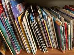 2 shelves of kids books
