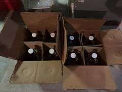 8 clear glass 1 gallon bottles, appear new