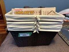 Three lined storage bins and school bus toy