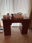 Small knee hole desk and assorted stemware, dishes etc...