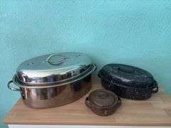 Stainless steel roaster and two granite ware roasters