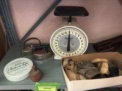 Hansen Model 2000 utility scale, two small sad irons, butter pat mold, Manson Tape tin, husking pegs