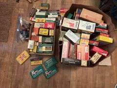 Grocery sack and box full of old cartridge boxes, most empty, some have hulls. Good man cave decor