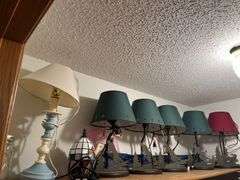 Five table lamps with winter themed base and three others