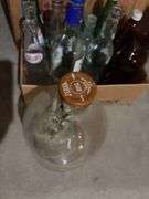Various glass bottles and jars includes blue glass, Coca-Cola 1 gallon bottle, old soda bottles, etc