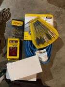 Rope, drop cords, bits, multipurpose plastic boxes, tape measure, bug spray, hooks, etc