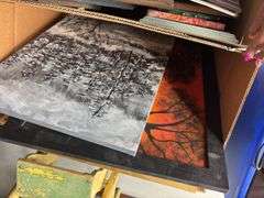 Two boxes of artwork