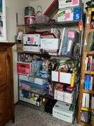 Boxes and boxes of fabric, Christmas, ribbon, decor boxes, paints/brushes, Legos, tins you name it, it's probably here.