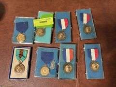 DeKalb, IA high school music association and Hoover trail medallions