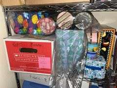 Boxes and boxes of fabric, Christmas, ribbon, decor boxes, paints/brushes, Legos, tins you name it, it's probably here.