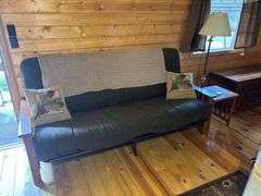 Futon, side table and lamp