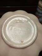 Three pieces of pottery-Shawnee, Red Wing and USA 1001