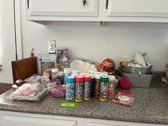 Variety of cake decorating supplies, candies, pans etc...