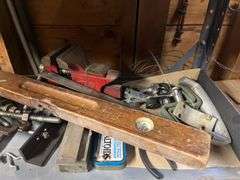 Level, vise, screwdrivers, air hose and drop cord Shelf 2 & 3, L side of shelf
