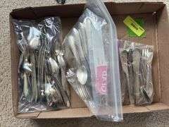Various flatware and serving spoons