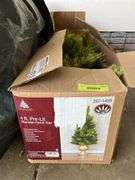 2 artifical Christmas trees and decorator tree