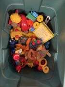 Tote of various toys from the 90's ish