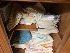 Lots of kitchen linens, plus candles, cups etc...