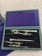 2 old drafting sets