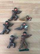 Plastic cowboys, Indians and horses and six lead soldiers