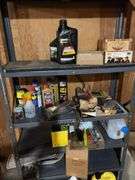 Contents of metal shelf and above stairs includes motor oil, deicers, washer fluid, extension cords, glues, etc