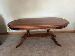 Amana walnut oval coffee table 21 x 44 x 18H