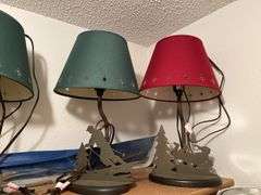 Five table lamps with winter themed base and three others