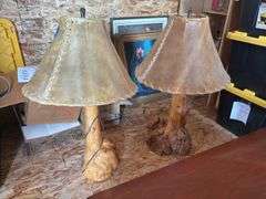 Two heavy burled pine lamps with rawhide shades