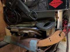 Shelf of various hand tools as shown