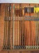 36 +/- mostly wood shaft traditional arrows and large quiver