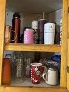 Glasses and cups, some plates and dishware