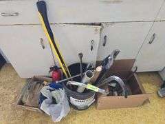 Axe, saw, loppers, crowbar, C clamps etc...